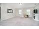 Spacious bonus room with carpet floors and a fireplace at 18763 Abigail Cir, Westfield, IN 46062