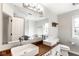 Bathroom with double sink vanity, wood countertop, and framed mirror at 197 Ceejay Dr, Greenwood, IN 46142