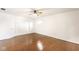 Large bedroom with hardwood floors, ceiling fan, and two closets for ample storage at 197 Ceejay Dr, Greenwood, IN 46142