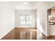 Inviting dining room with hardwood floors and a large window letting in natural light at 197 Ceejay Dr, Greenwood, IN 46142