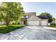 Charming two-story home featuring a three car garage, well-manicured lawn, and mature trees at 197 Ceejay Dr, Greenwood, IN 46142