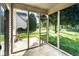 Screened porch with views of backyard at 197 Ceejay Dr, Greenwood, IN 46142