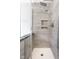This shower features a built-in shelf and a rainfall shower head at 197 Ceejay Dr, Greenwood, IN 46142