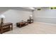 Finished basement featuring a laminated floor, neutral paint, and natural light from the windows at 2075 Rhettsbury St, Carmel, IN 46032