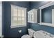 Cozy bathroom with sink, toilet, medicine cabinet, and window allowing for great light at 2075 Rhettsbury St, Carmel, IN 46032