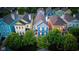 Aerial view of colorful, two-story homes with landscaped yards in a vibrant community at 2075 Rhettsbury St, Carmel, IN 46032