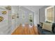 Spacious living area featuring built-in bookshelves and a cozy sofa, perfect for relaxation at 2075 Rhettsbury St, Carmel, IN 46032