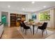 Dining room area featuring a dining table, modern decor, and lots of natural light at 2233 S Miller Ave, Shelbyville, IN 46176