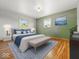 Well-lit main bedroom boasting hardwood floors, modern decor, and serene blue accents at 2233 S Miller Ave, Shelbyville, IN 46176