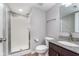 Clean bathroom with a walk-in shower, granite vanity, and modern fixtures at 2436 Gwinnett St, Carmel, IN 46032