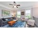 Bright living room featuring modern furnishings, large windows, and stylish decor at 2436 Gwinnett St, Carmel, IN 46032