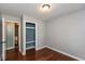 Simple yet elegant bedroom features wood flooring, neutral walls, and a closet at 2519 N Boehning St, Indianapolis, IN 46219