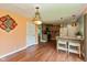Spacious kitchen with a breakfast bar, stylish light fixtures, and modern appliances at 2519 N Boehning St, Indianapolis, IN 46219