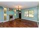 Inviting living room features a modern fireplace, hardwood floors, and a bright window at 2519 N Boehning St, Indianapolis, IN 46219