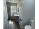 Modern bathroom featuring a walk-in shower and new vanity at 2911 E 35Th St, Indianapolis, IN 46218