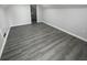 Spacious upper room with new flooring, offering flexibility for living or storage at 2911 E 35Th St, Indianapolis, IN 46218
