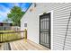 This is a nice view of the back deck and secure door on the rear of this cute home at 2936 N Gladstone Ave, Indianapolis, IN 46218