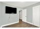 Bedroom features an updated closet and new flooring, freshly painted in neutral tones at 2936 N Gladstone Ave, Indianapolis, IN 46218