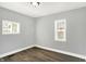 Bedroom featuring fresh paint, new floors, and windows for ample natural light at 2936 N Gladstone Ave, Indianapolis, IN 46218