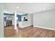 Open living space featuring a breakfast bar with modern lighting and appliances at 2936 N Gladstone Ave, Indianapolis, IN 46218