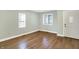 Bright living room featuring attractive wood flooring and natural light at 2936 N Gladstone Ave, Indianapolis, IN 46218