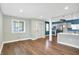 Bright and airy open living space featuring modern finishes and attractive wood flooring at 2936 N Gladstone Ave, Indianapolis, IN 46218
