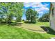 Beautiful backyard putting green for practicing your short game at 3398 Nottinghill Blvd, Plainfield, IN 46168