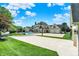 Spacious backyard features a swimming pool, basketball court, and lush greenery at 3398 Nottinghill Blvd, Plainfield, IN 46168