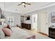 bedroom with a daybed, dark wood dresser, and built-in shelves at 3398 Nottinghill Blvd, Plainfield, IN 46168