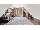 Spacious bonus room featuring workout equipment, wood paneled walls and a decorative area rug at 3398 Nottinghill Blvd, Plainfield, IN 46168