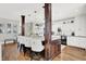 The large kitchen island includes bar seating, granite countertops, and pendant lighting at 3398 Nottinghill Blvd, Plainfield, IN 46168