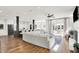 Bright living room boasts hardwood floors, a fireplace, and seamless access to the outdoor living area at 3398 Nottinghill Blvd, Plainfield, IN 46168