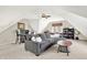Cozy living room with plush seating, a ceiling fan, and a window with a view at 3398 Nottinghill Blvd, Plainfield, IN 46168