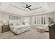 Spacious main bedroom with tray ceiling, recessed lighting, and neutral tones at 3398 Nottinghill Blvd, Plainfield, IN 46168