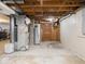 Unfinished basement with exposed ductwork, painted walls, and concrete flooring at 3538 Whalen Ave, Indianapolis, IN 46227