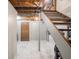 Basement featuring tile floors, walls, stairs and a wooden support column at 3538 Whalen Ave, Indianapolis, IN 46227