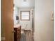 Bathroom featuring a sink vanity, toilet, window, and walk-in shower at 3538 Whalen Ave, Indianapolis, IN 46227