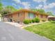 Brick ranch home with mature landscaping, manicured lawn and charming exterior features at 3538 Whalen Ave, Indianapolis, IN 46227