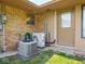 Exterior view of brick home showing back door, HVAC equipment, and walkway at 3538 Whalen Ave, Indianapolis, IN 46227