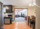 Open kitchen and dining area leading to a living space with comfortable seating and natural light at 3538 Whalen Ave, Indianapolis, IN 46227