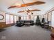 Spacious living room with a vaulted ceiling, exposed wood beams, and carpet floors at 3538 Whalen Ave, Indianapolis, IN 46227