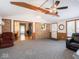 Spacious living room featuring brick accents and an open layout, perfect for entertaining guests at 3538 Whalen Ave, Indianapolis, IN 46227