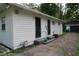 Exterior of home with a backyard featuring a fenced-in yard and a covered patio at 4353 Evanston Ave, Indianapolis, IN 46205