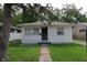 Charming single-story home featuring a minimalist design and a well-maintained front yard at 4353 Evanston Ave, Indianapolis, IN 46205