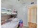 Bunk bedroom featuring a comfortable bunk bed and ample storage space, ideal for a room at 4415 N Longworth Ave, Indianapolis, IN 46226