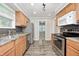 Modern kitchen with stainless steel appliances, granite countertops, and stylish backsplash at 4621 E 17Th St, Indianapolis, IN 46218
