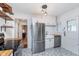 Stylish kitchen with stainless appliances and a farmhouse style sink at 4641 Ralston Ave, Indianapolis, IN 46205