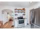 Bright kitchen with stainless steel appliances and decoratively tiled flooring at 4641 Ralston Ave, Indianapolis, IN 46205