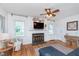Bright living room features a fireplace, hardwood floors, and a comfortable seating area at 4641 Ralston Ave, Indianapolis, IN 46205