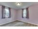 Small bedroom with hardwood floors and neutral paint at 521 Elmhurst Pl, Whiteland, IN 46184